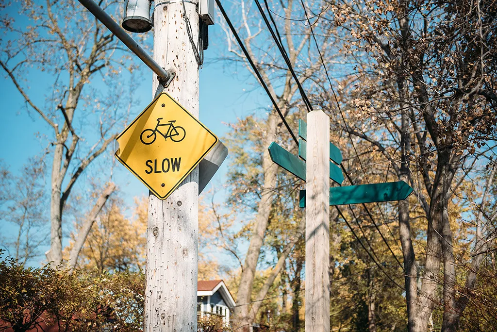 Street sign with "slow" written